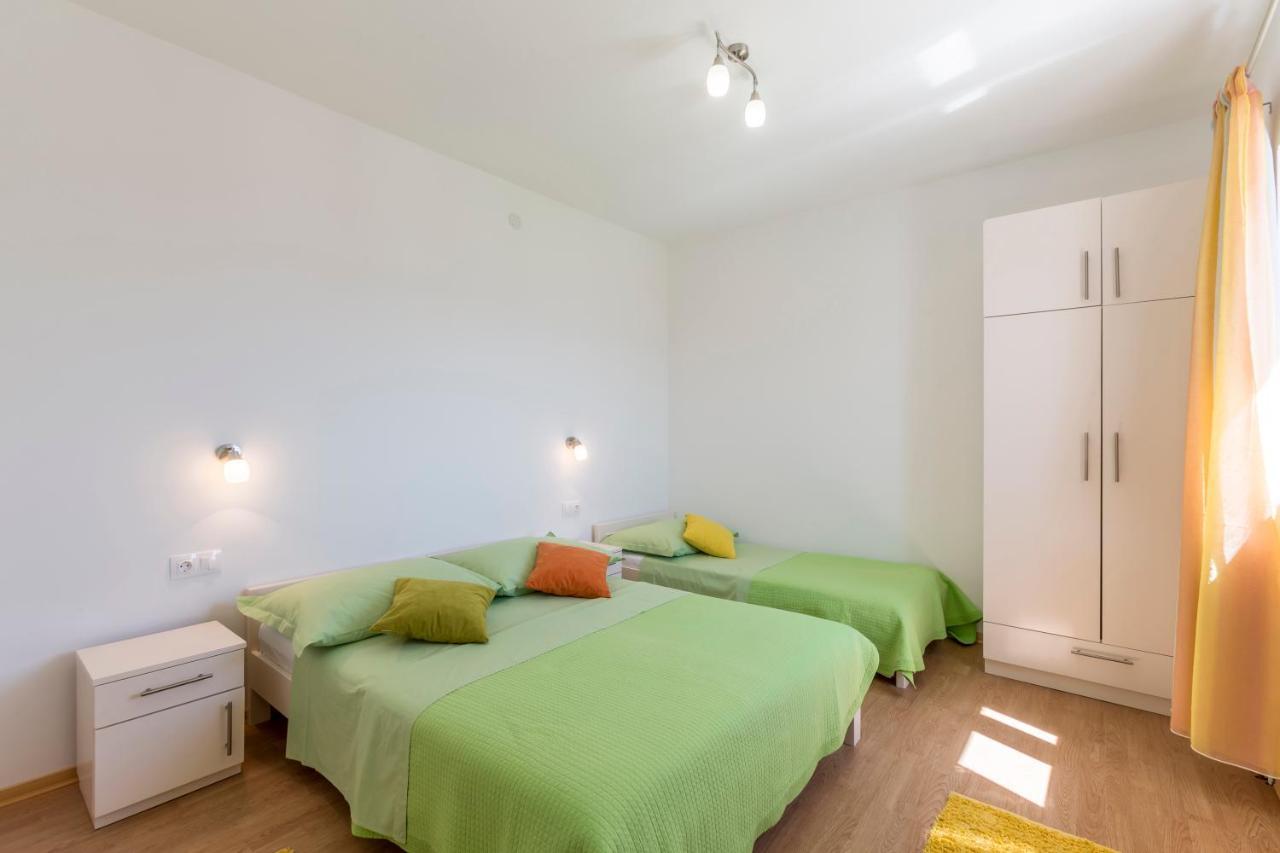 Apartmani Bezmalinovic Bol Buitenkant foto